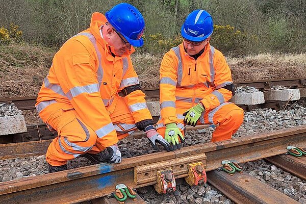 Ian Roome with a rail engineer