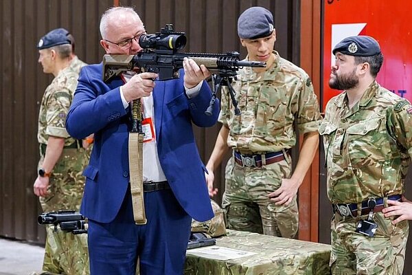 Ian Roome with rifle